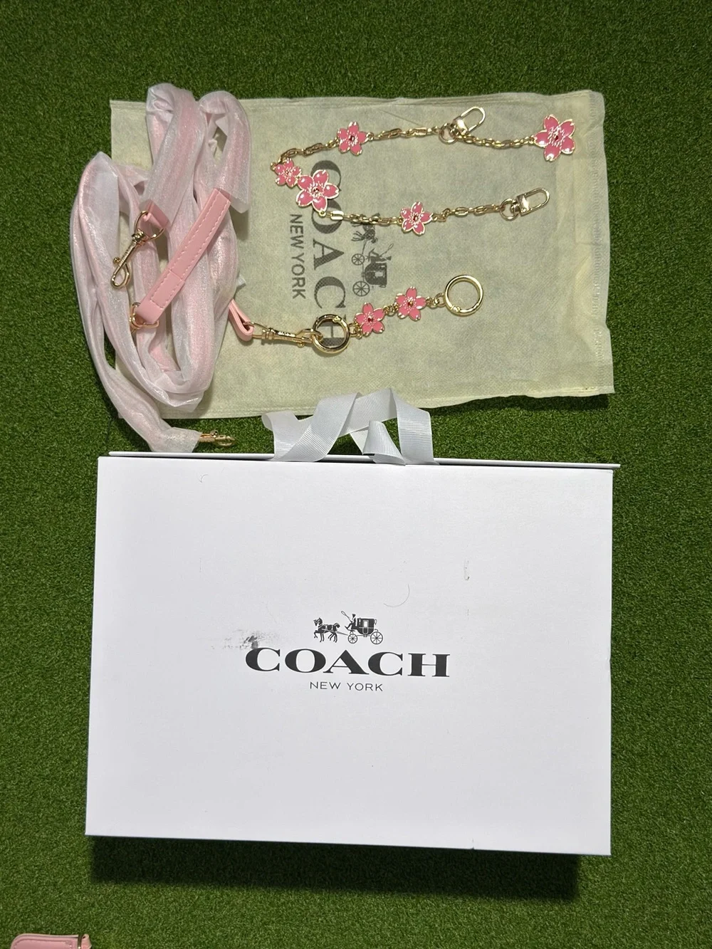 Coach Pink Signature Canvas Wristlet with Floral Charm Chain